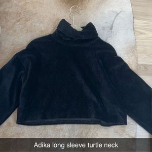 Adika long sleeve velvet turtle neck. Size medium. $17
